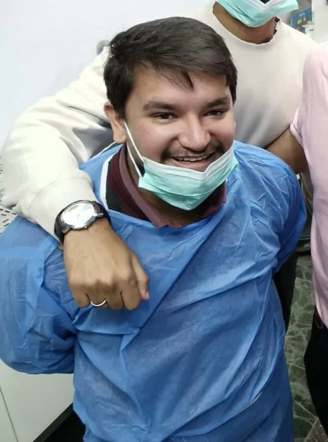 Dental professional during a clinical procedure