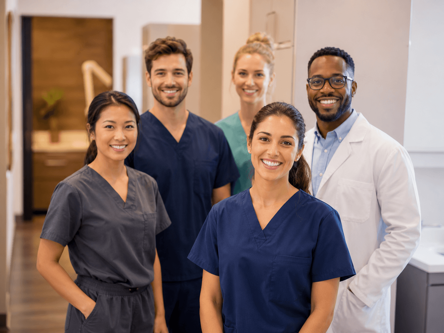 Group of confident dental professionals — 500+ trusted partners of Clear Moves Aligners across 30+ countries